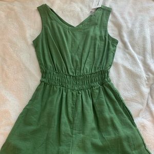 Cute green romper brand new! Size S, I would get if you usually wear a medium